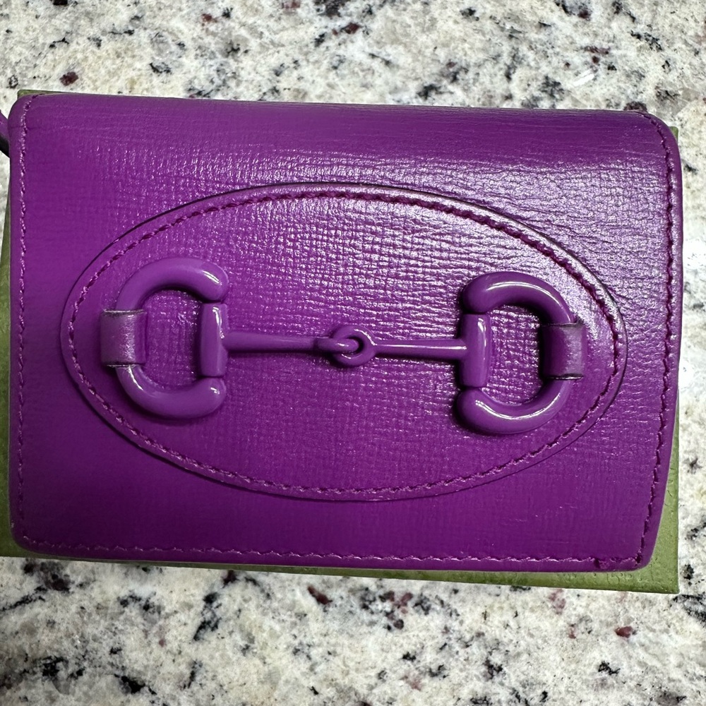 Gucci Authentic leather wallet in Purple color